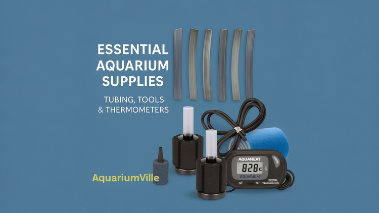 Aquarium supplies displayed on a blue background, including airline tubing, sponge filters, an air stone, a thermometer, and a roll of tubing, with the text “Essential Aquarium Supplies – Tubing, Tools & Thermometers” and the AquariumVille logo below.