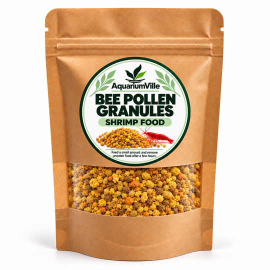 A stand-up kraft paper pouch of AquariumVille Bee Pollen Granules Shrimp Food, featuring a clear window showing the yellow and brown granules inside.