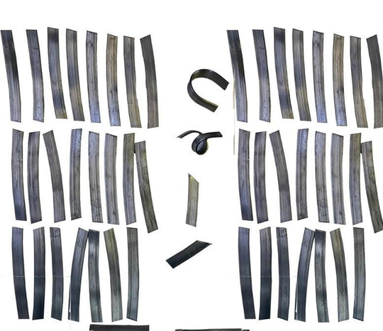 A collection of black metal strips, some are straight and some are curved. The strips are arranged in two groups, one on the left and one on the right. The strips are all the same size and shape. they are used as weights to keep live aquatic plants from floating up.