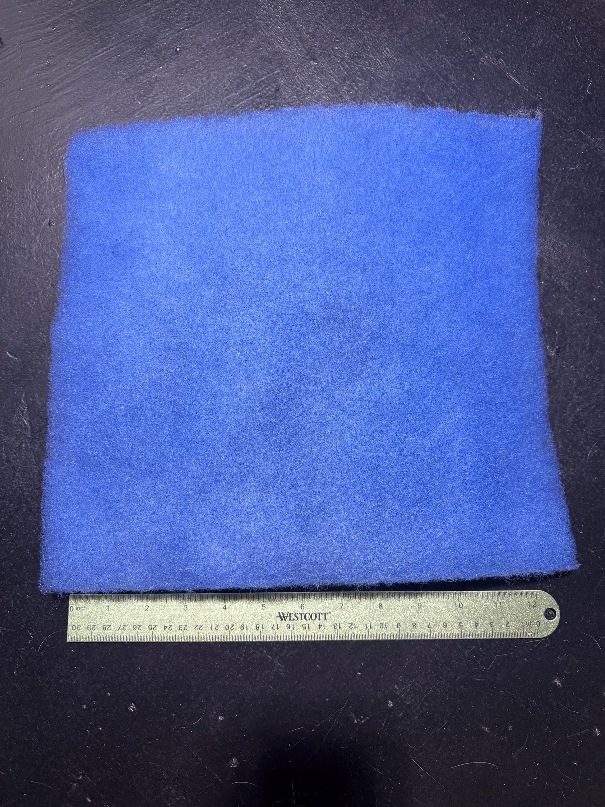 12x12 inch aquarium filter floss pad on white background, blue and white mechanical filter media sheet for fish tanks and aquariums that helps trap debris and polish water clarity