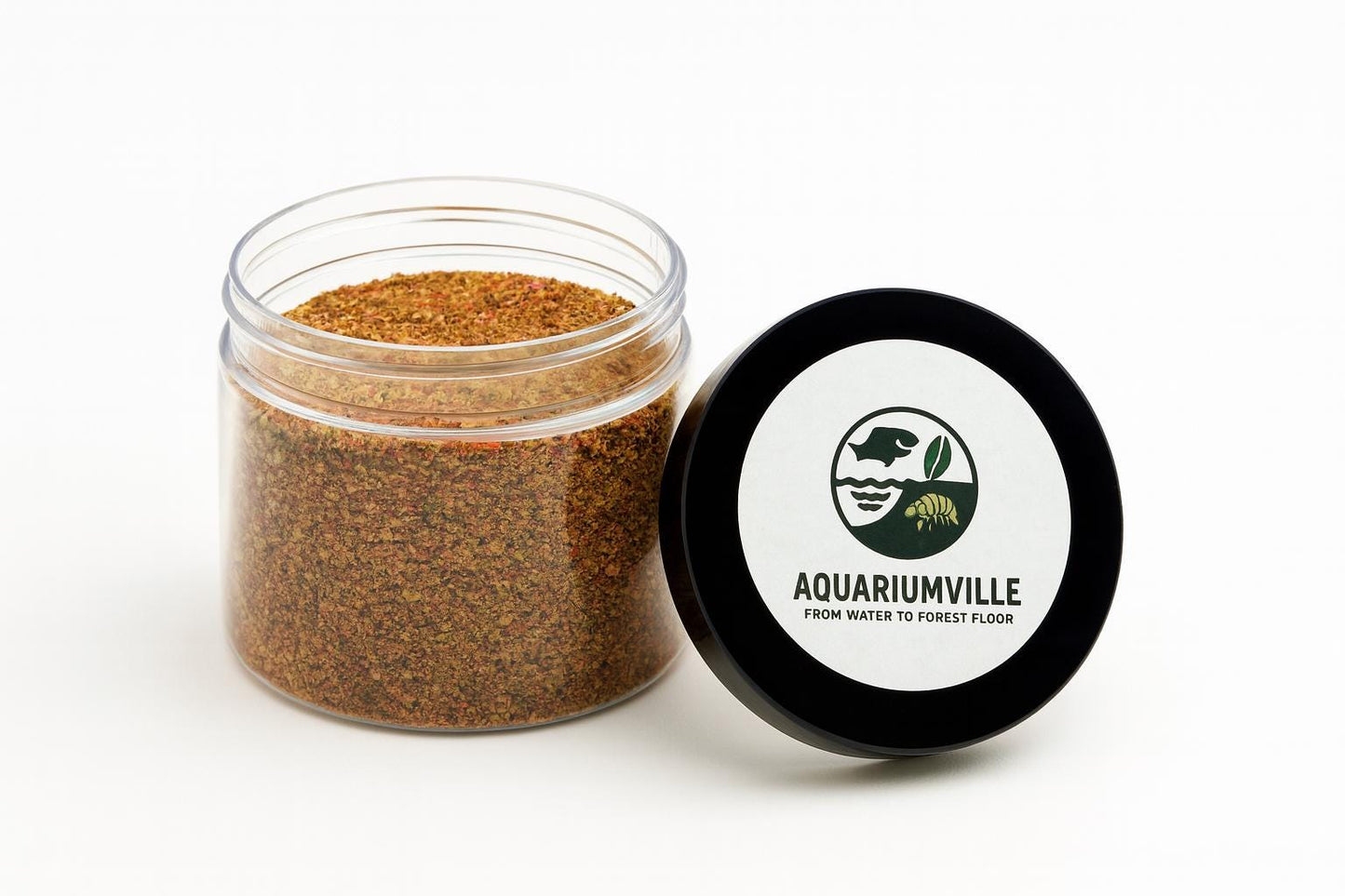 AquariumVille isopod and microfauna substrate mix in a clear plastic jar with the black lid placed beside it, featuring the AquariumVille logo and the slogan “From Water to Forest Floor” on a clean white background.