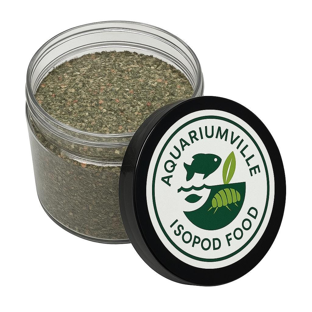 AquariumVille Isopod Food in a clear plastic jar with black lid, showing green nutrient mix inside and a white circular label with fish and isopod logo.