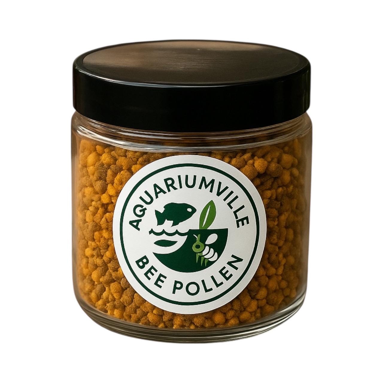 Bee pollen granules shrimp food in a clear AquariumVille jar with branded logo and black lid.